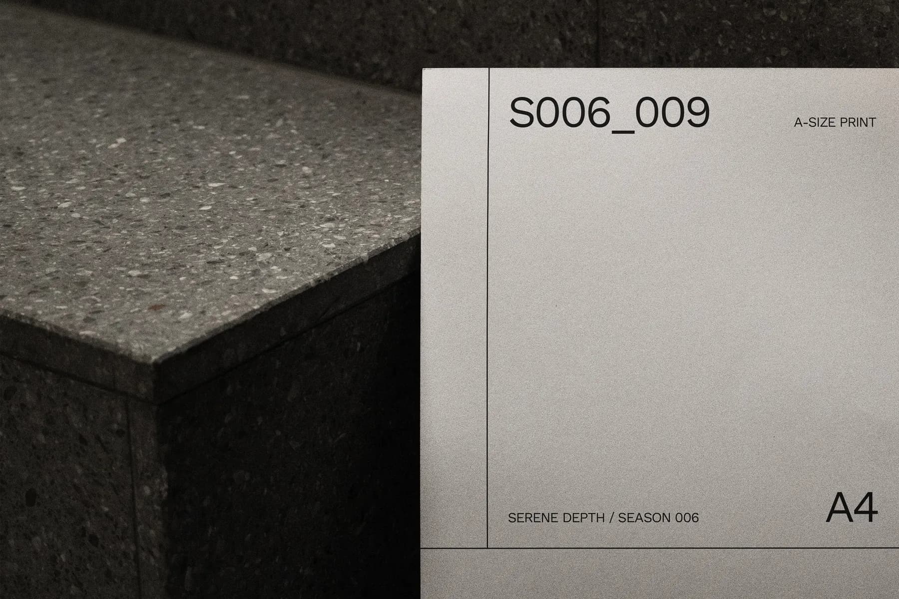 Detailed view of an A4 poster mockup highlighting text and surface grain, positioned against a dark stone staircase.