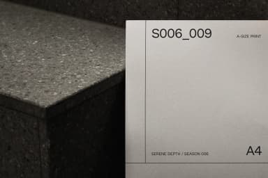 Detailed view of an A4 poster mockup highlighting text and surface grain, positioned against a dark stone staircase.