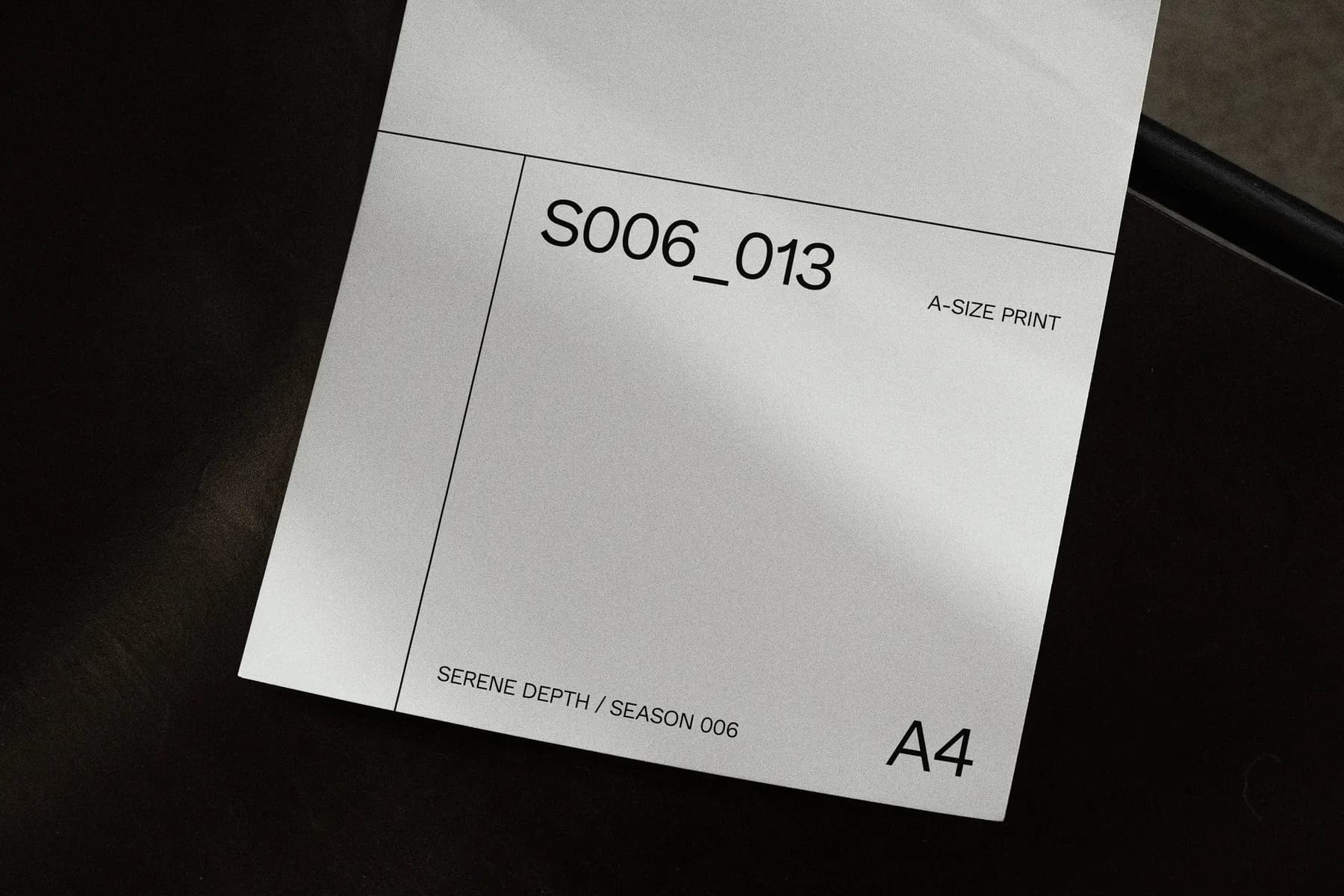 A4 poster mockup with a light minimalist design, featuring the S006_013 code and SédShop.Co branding, placed on a dark chair for a clean presentation.
