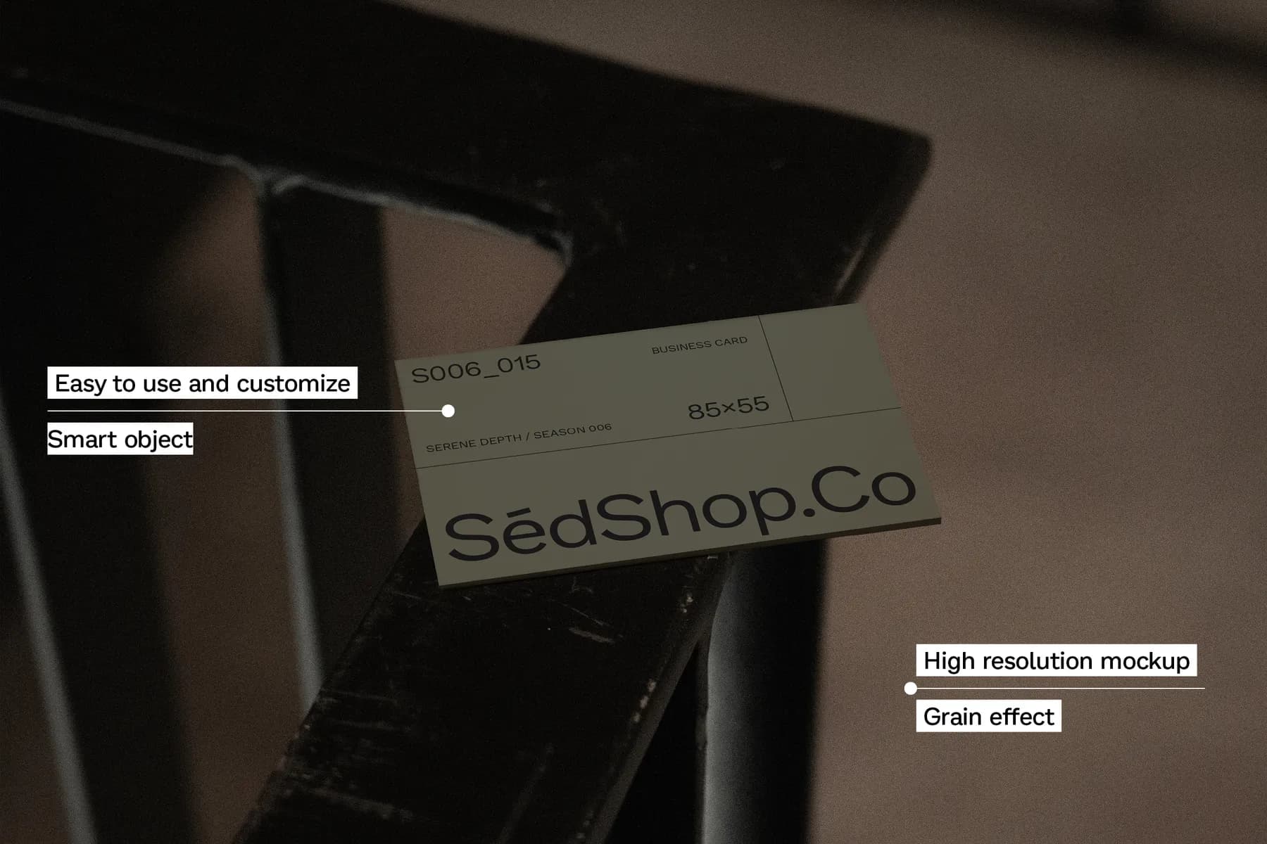 Business card mockup on dark surface, emphasizing easy customization, high resolution, and grain effect.