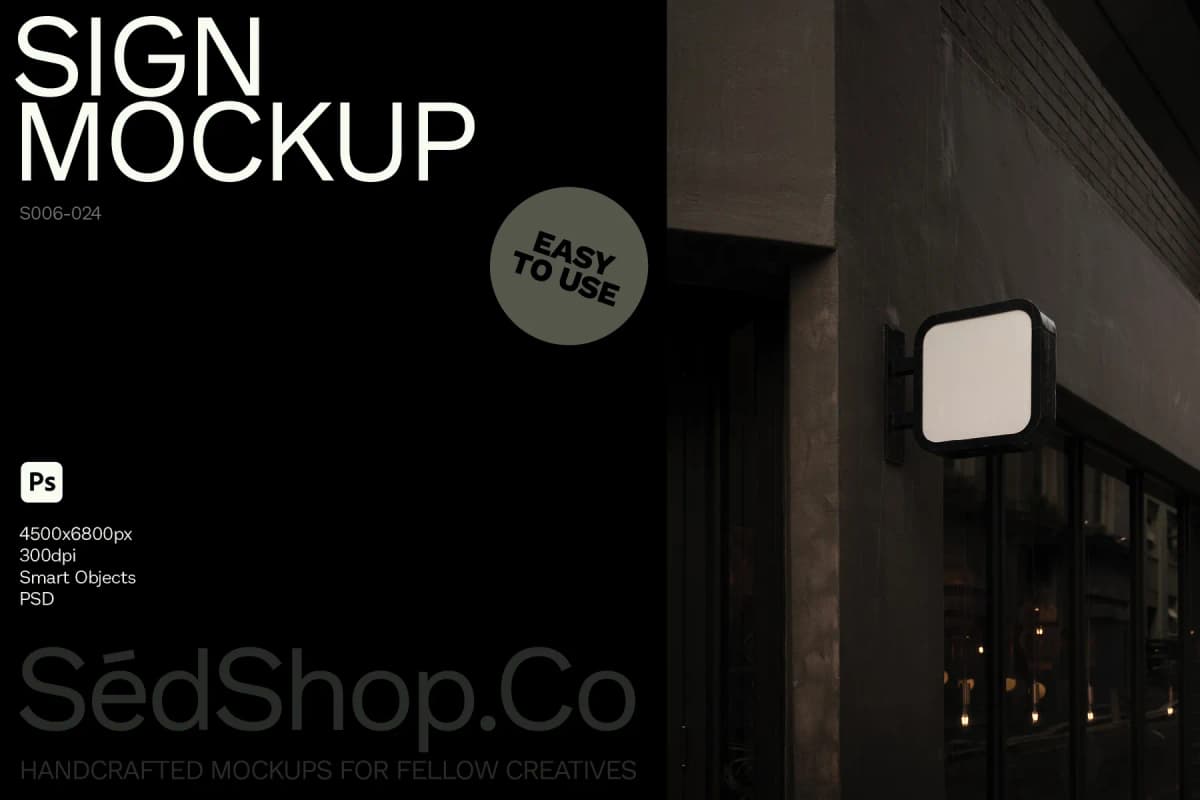 Sign mockup with a blank design mounted on a dark building, ready for customization, featuring a realistic urban setting.