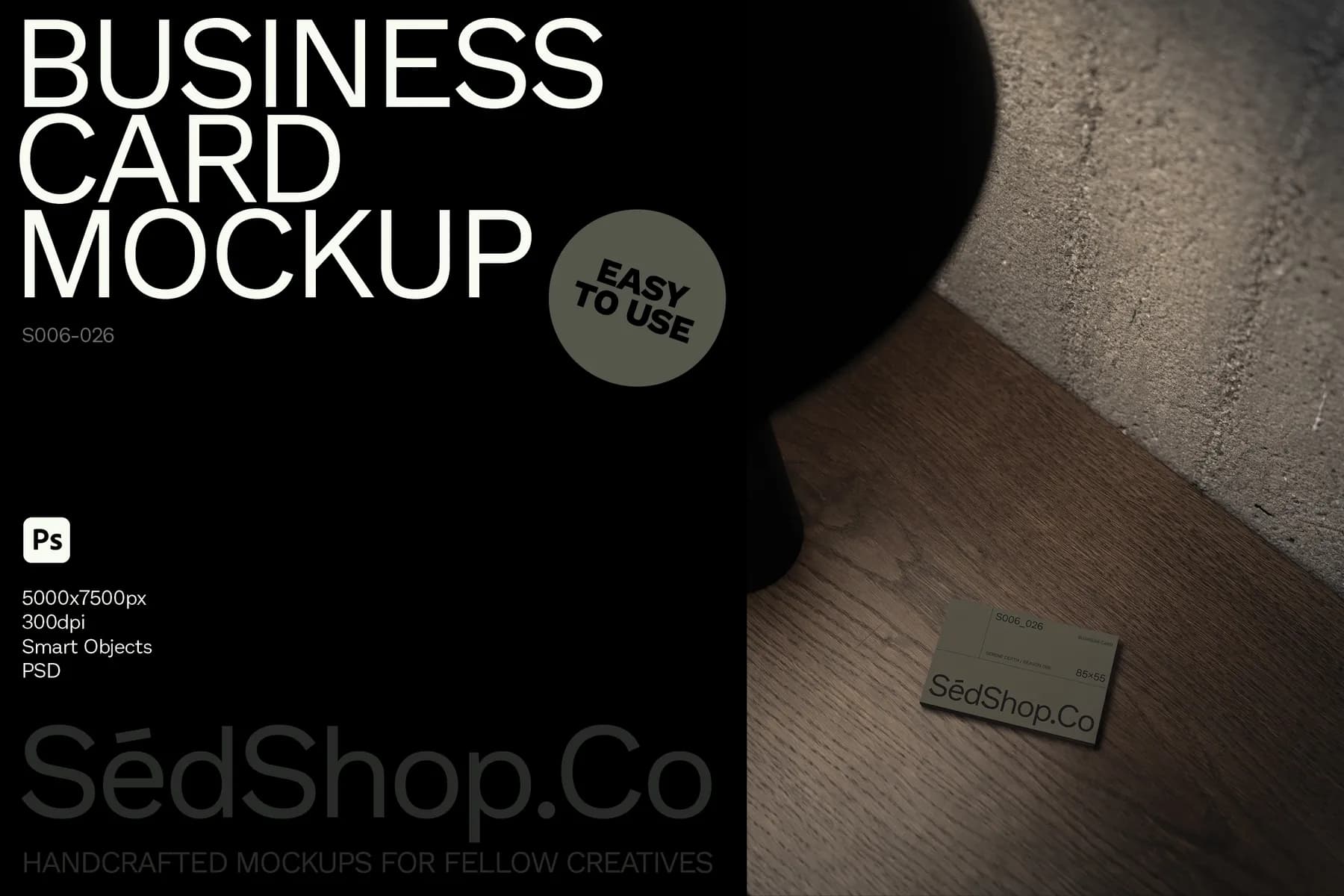 Business card mockup lying on a wooden surface, partially in shadow, showcasing customizable features and a realistic textured background.