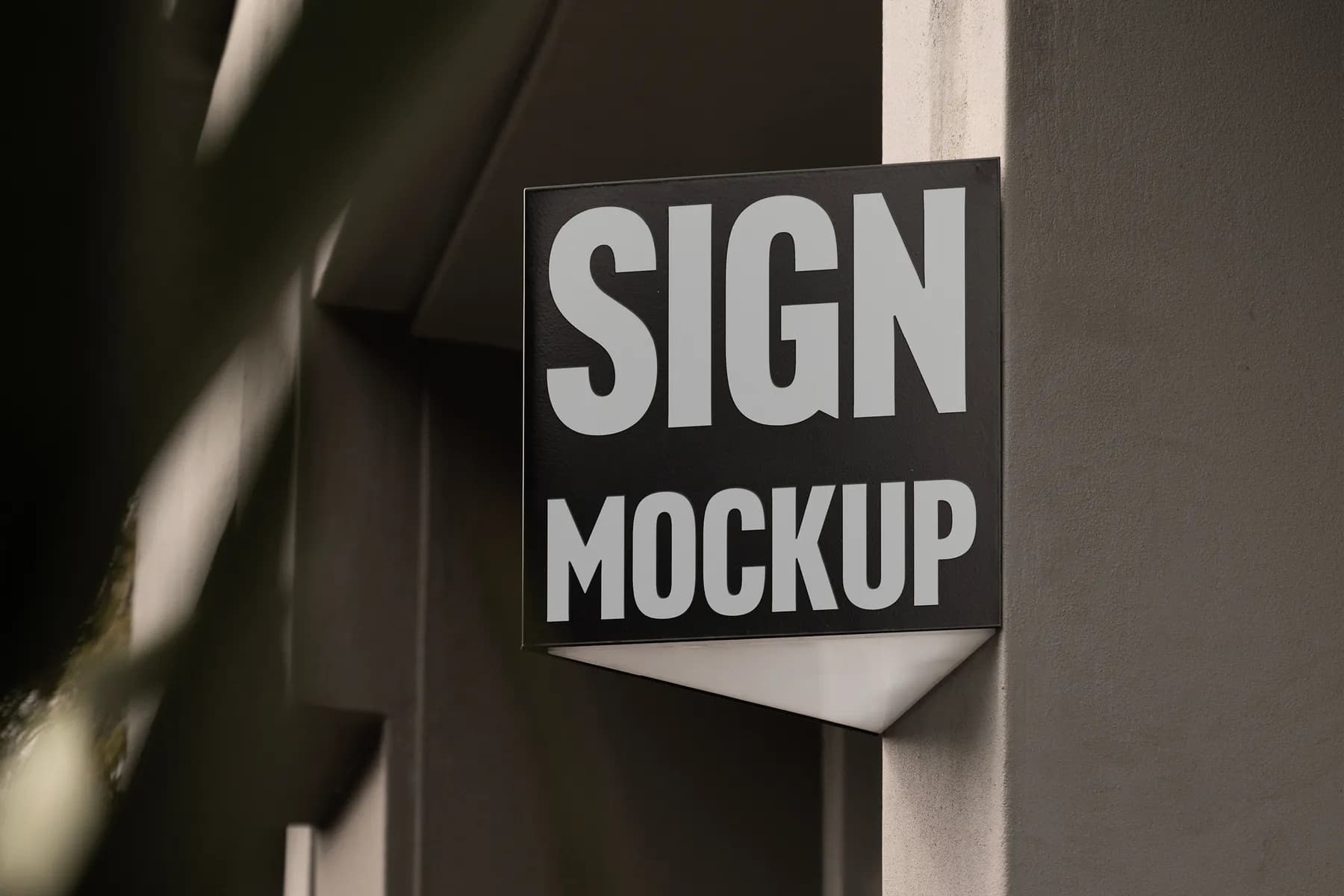 Close-up of a cut-out sign mockup on a building, displaying 'SIGN MOCKUP' text, ideal for showcasing signage designs in an urban setting.