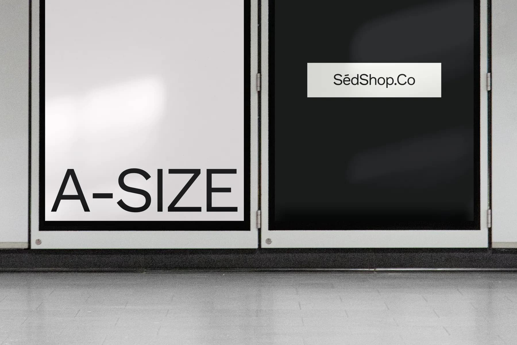 Minimalist A-size poster mockup with one black and one white poster, on a tiled wall with floor reflections.