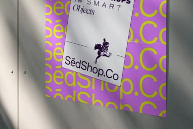 Close-up of a poster mockup on a purple background with SedShop.Co text, displayed on a light surface with shadows.